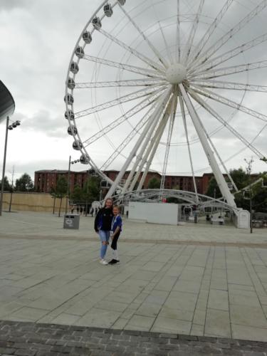 Gymnasts in front of Wheel of Liverpool